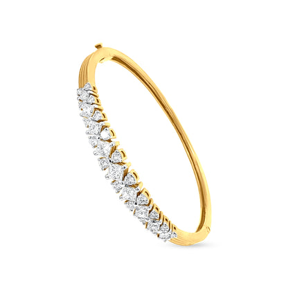 Gold Bangle with Unique Clasp and Diamond Embellishments